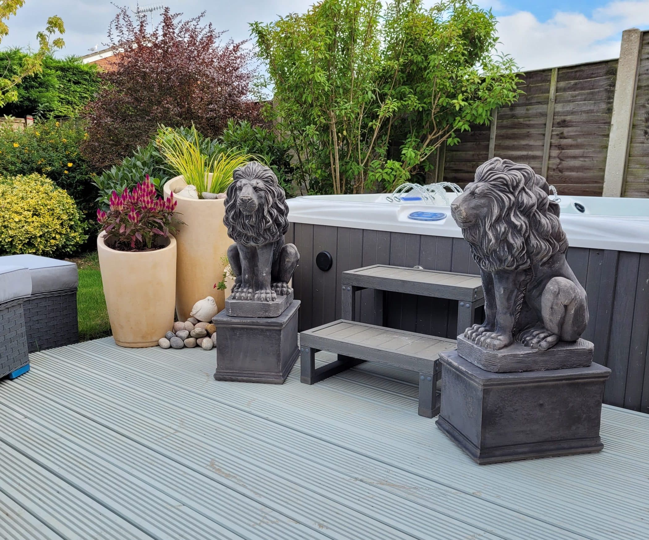 Pair of Sitting Lions On Plinths