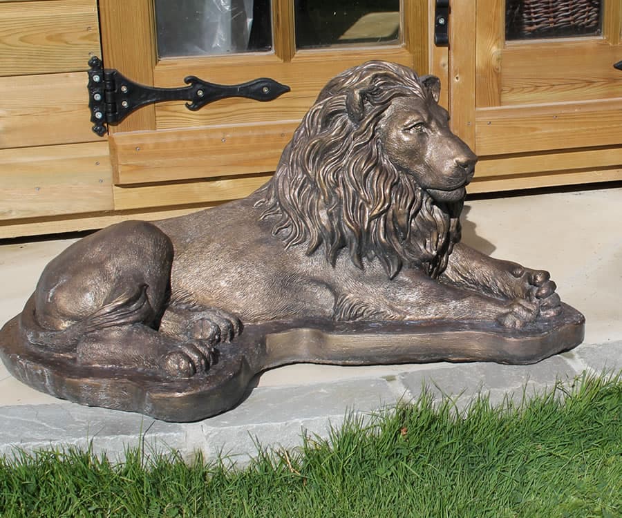 Pair of Small Laying Lions
