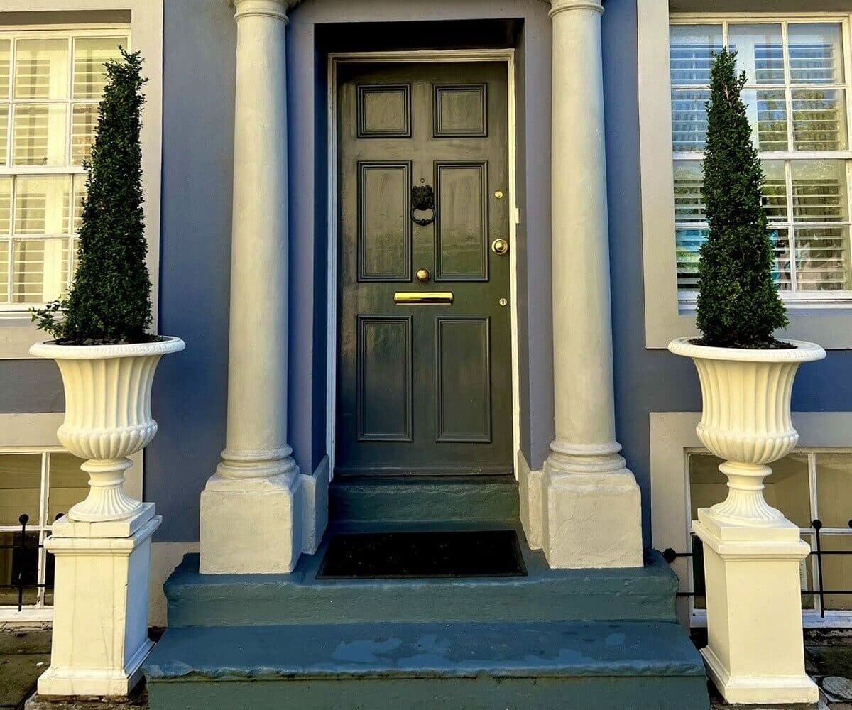 Pair of Georgian Urns on Classic Plinths