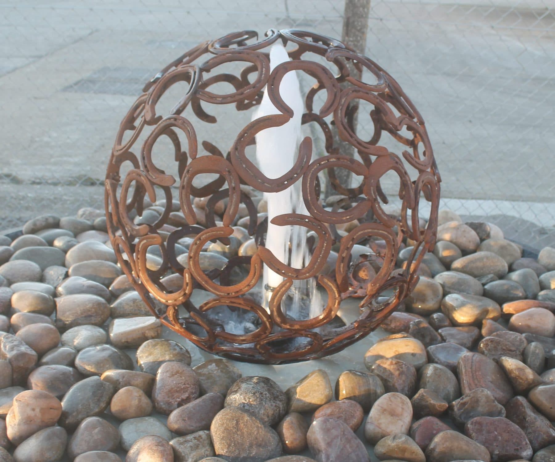 Riviera water fountain with Horse shoe sphere