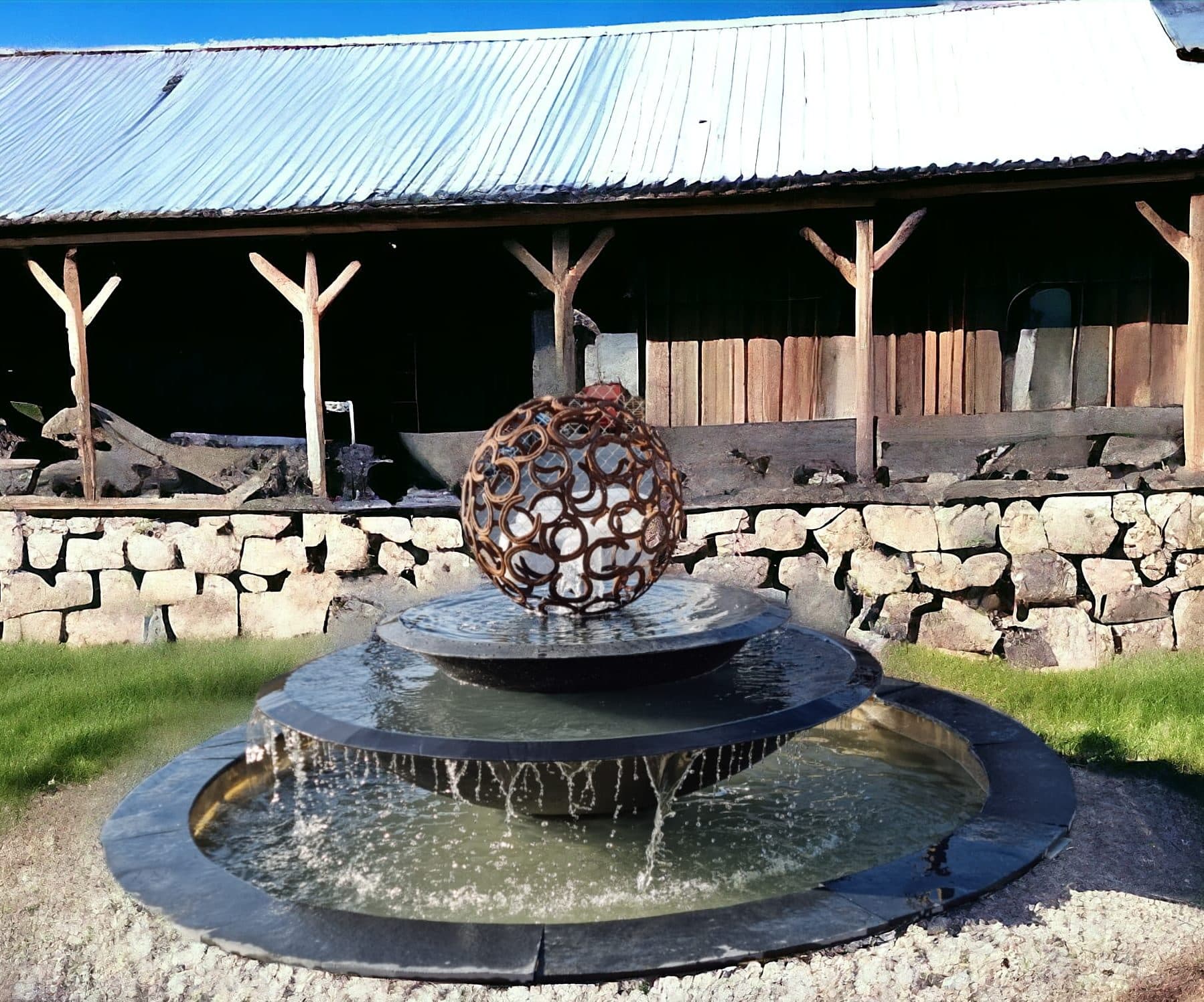 Circular Richmond water fountain with Riviera bowl and Horse shoe sculpture