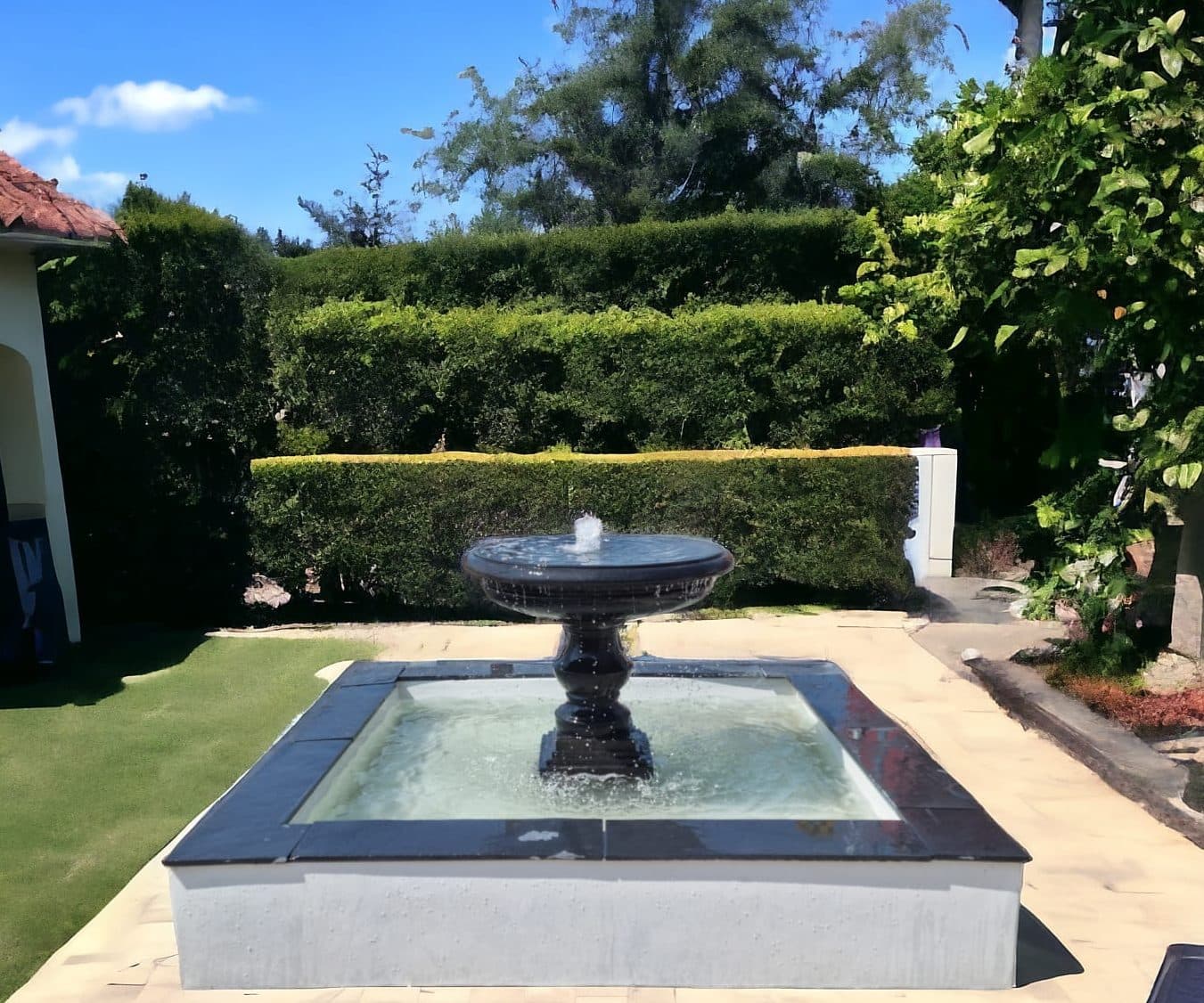 Square Hayward pool with Regis fountain